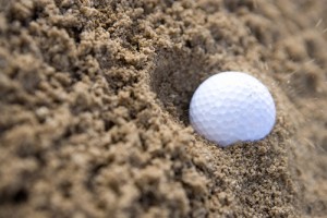 Golf ball in bunker